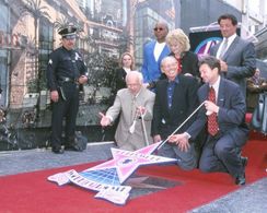 Sylvester Stallone, Angie Dickinson, Carl Weathers, Johnny Grant, and Irwin Winkler