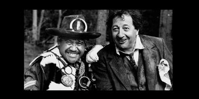 Peter Bland and Billy T. James in Came a Hot Friday (1985)