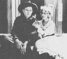 Harry Carey and Peggy Pearce in Ace of the Saddle (1919)