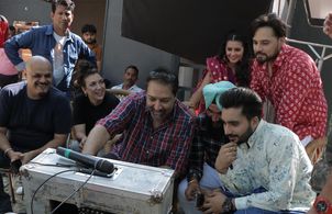 Producer Puneet Sira, D.O.P. Rakesh Singh (standing),screenwriter Vekeana Dhillon, director Vikram Dhillon with Waris S