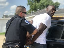 Officer Johnson apprehending a suspect on THE DEAL
