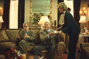 Director Val Waxman (WOODY ALLEN, left) and his agent Al Hack (MARK RYDELL) meet with studio executive Ellie (TÉA LEONI)