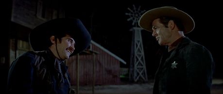 Rodolfo Acosta and Robert Ryan in The Proud Ones (1956)