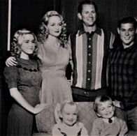 Heather Graham, Chad Willett, Kiernan Shipka, Mason Dye, Maxwell Kovach, and Ava Telek in The Dollanganger Saga: Flowers