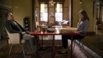 Jonny Lee Miller and Joanna Christie in Elementary (2012)