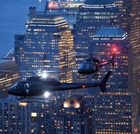 Nikon, National Geographic. Helicopter over Manhattan skyline, NYC. Kachina Dechert, Stuntwoman