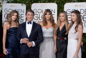 Sylvester Stallone, Jennifer Flavin, Sophia Rose Stallone, Sistine Rose Stallone, and Scarlet Rose Stallone at an event 