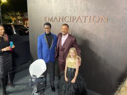 Merah Benoit shown with Will Smith, Gilbert Owuor at 