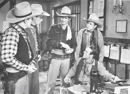 John Bagni, Sammy Baugh, Howard Hughes, Kermit Maynard, and William Kellogg in King of the Texas Rangers (1941)