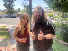 BTS Photo of actors Lorelei Linklater and Brandon Krum on the set of Mistletoe Massacre!