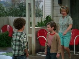 Easton Gage, Debra Jo Rupp, and Brett Buford in That '70s Show (1998)
