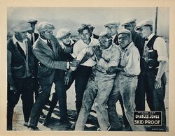 Fred Eric, Buck Jones, Earl Metcalfe, Claude Payton, and Harry Tracy in Skid Proof (1923)