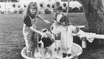 Nicholle Tom, Christopher Castile, Sarah Rose Karr, and Chris in Beethoven (1992)