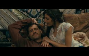 Edgar Ramirez and Razane as Lana Jarrar in the golden globe winner Tv-series Carlos, by Olivier Assayas.