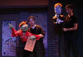 Nathan, performing live in Avenue Q.