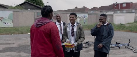 Wunmi Mosaku and Rasaq Kukoyi in His House (2020)