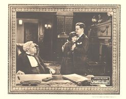 Thomas Carrigan, Tom Guise, and Laura La Plante in Crooked Alley (1923)