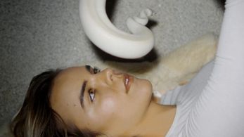 Meredith Johnston in the Warm Human music video 'Down'