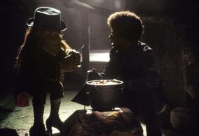 Warwick Davis and Barima McKnight in Leprechaun 5: In the Hood (2000)