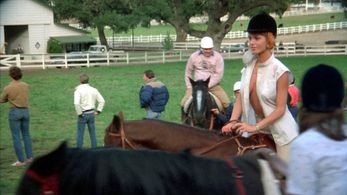 Betsy Russell and Michael Zorek in Private School (1983)