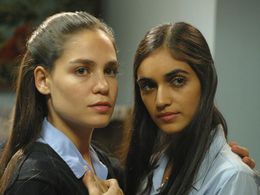 Liraz Charhi and Neta Garty in Turn Left at the End of the World (2004)