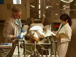 Jonathan Thomson and Michelle Haro in The Coroner: I Speak for the Dead (2016)