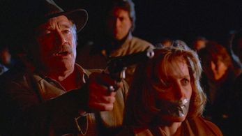 Gillian Anderson and John Milford in The X-Files (1993)