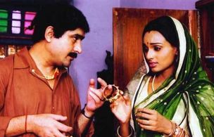 Yashpal Sharma and Reshmi Ghosh in Bazaar E Husn (2014)