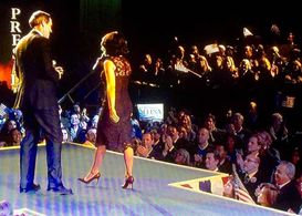 VEEP Season 4...Security Guard (in yellow jacket at Selena's knee level-)