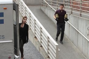 Matt Bomer and Gloria Votsis in White Collar (2009)