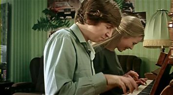 Fyodor Dunayevsky and Anastasiya Nemolyaeva in Courier (1986)