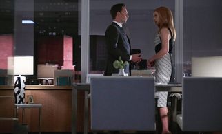Patrick J. Adams and Sarah Rafferty in Suits (2011)