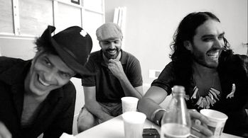 Discussing Russel Brand's character on the set of Noel Gallagher's AKA...What a Life.