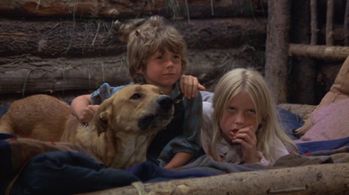 Hollye Holmes and Ham Larsen in The Adventures of the Wilderness Family (1975)