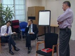 Chris Langham, James Smith, and Chris Addison in The Thick of It (2005)