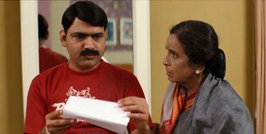 Usha Nadkarni and Makarand Anaspure in Agadbam (2010)