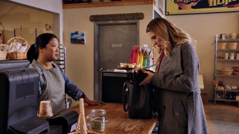 Alexandra Breckenridge and Paulyne Wei in Christmas Around the Corner (2018)