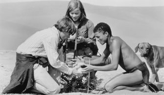 Reese Witherspoon, Sarel Bok, and Ethan Embry in A Far Off Place (1993)