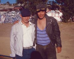 On the set of THE MASTER with Jet Li after he beat me up (on camera) all day long!