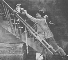 Wally Oettel and Pearl White in Plunder (1923)