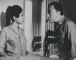 Geula Nuni and Raymond Pellegrin in A Night in Tiberias (1965)