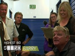 Dan Dotson, Laura Dotson, and Darrell Sheets in Storage Wars (2010)