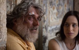 Lior Ashkenazi and Liat Harlev in The Exchange Principle (2016)