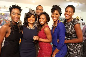 on set with the cast of 