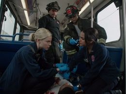 Lauren German, Charlie Barnett, Monica Raymund, and Joe Minoso in Chicago Fire (2012)