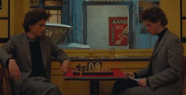 Mohamed Belhadjine and Timothée Chalamet in The French Dispatch (2021)