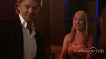 John Schneider and Kelly Godell in Leverage (2008)
