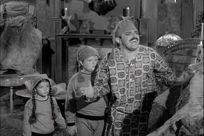 John Astin, Lisa Loring, and Ken Weatherwax in The Addams Family (1964)