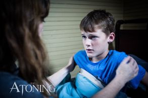 Screen shot of Cannon Bosarge and Virginia Newcomb in the horror thriller The Atoning (2017) - by Michael Williams