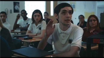 Natalia Dyer and Christian Adam in Yes, God, Yes (2019)